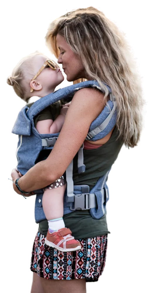 A woman kissing her child